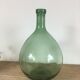 Vintage green demijohn