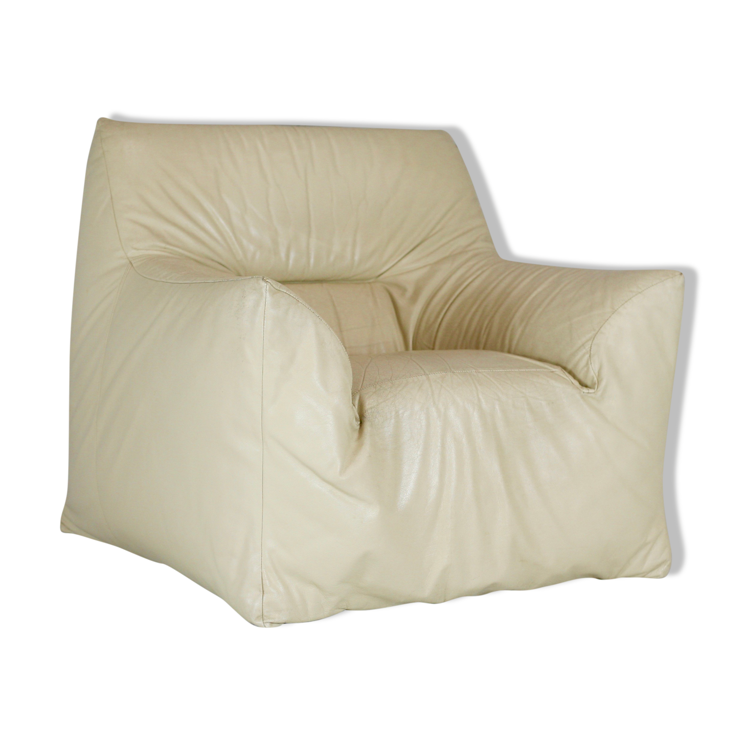 Leather armchair and cream-coloured foam, France , circa 1970