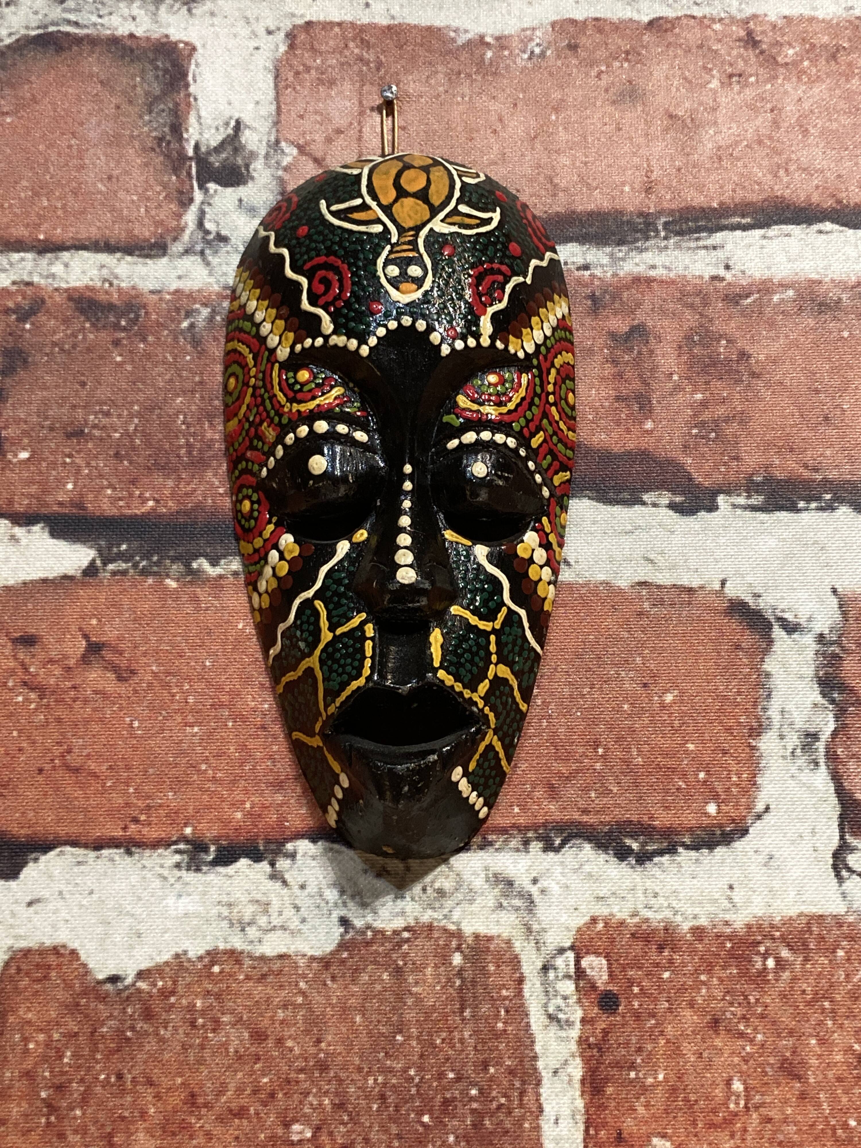 Wooden wall mask