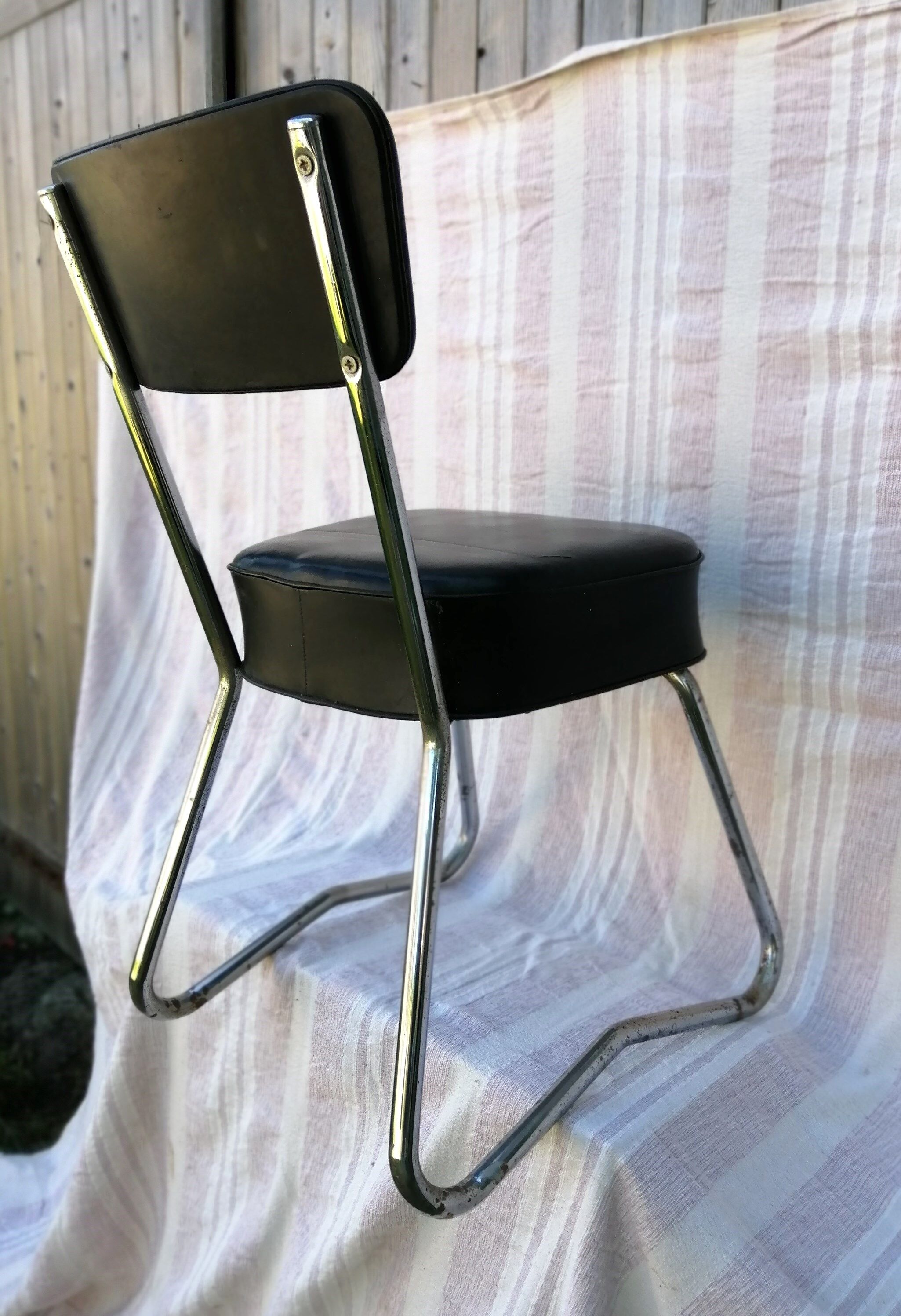 Chrome and skai industrial chair