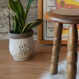 Old farm stool, wooden tripod campaign