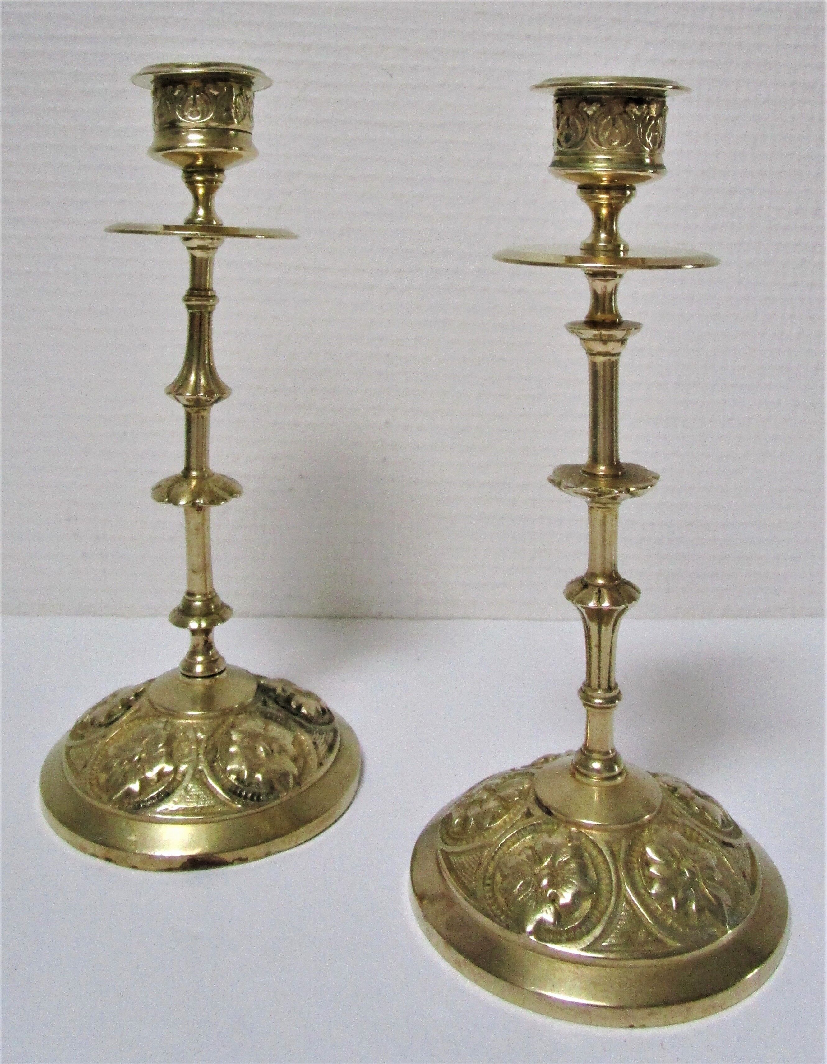 Pair of vintage brass candlesticks decorated with flowers