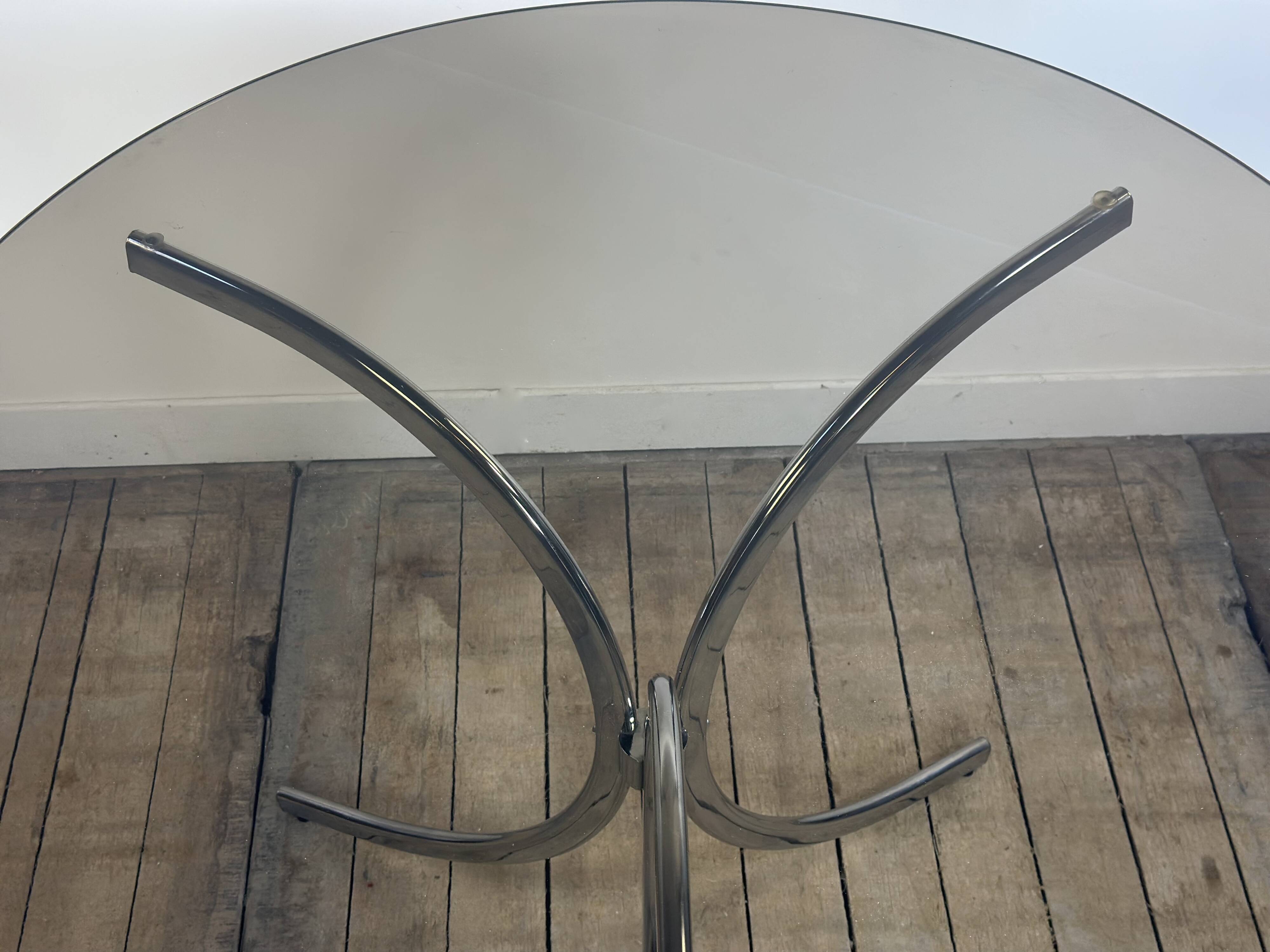 Vintage 1970s round metal and smoked glass table