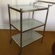 Metal and sand glass rolling table