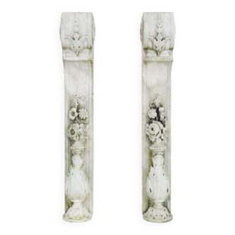 Pair of old fireplace jambs carved in white marble