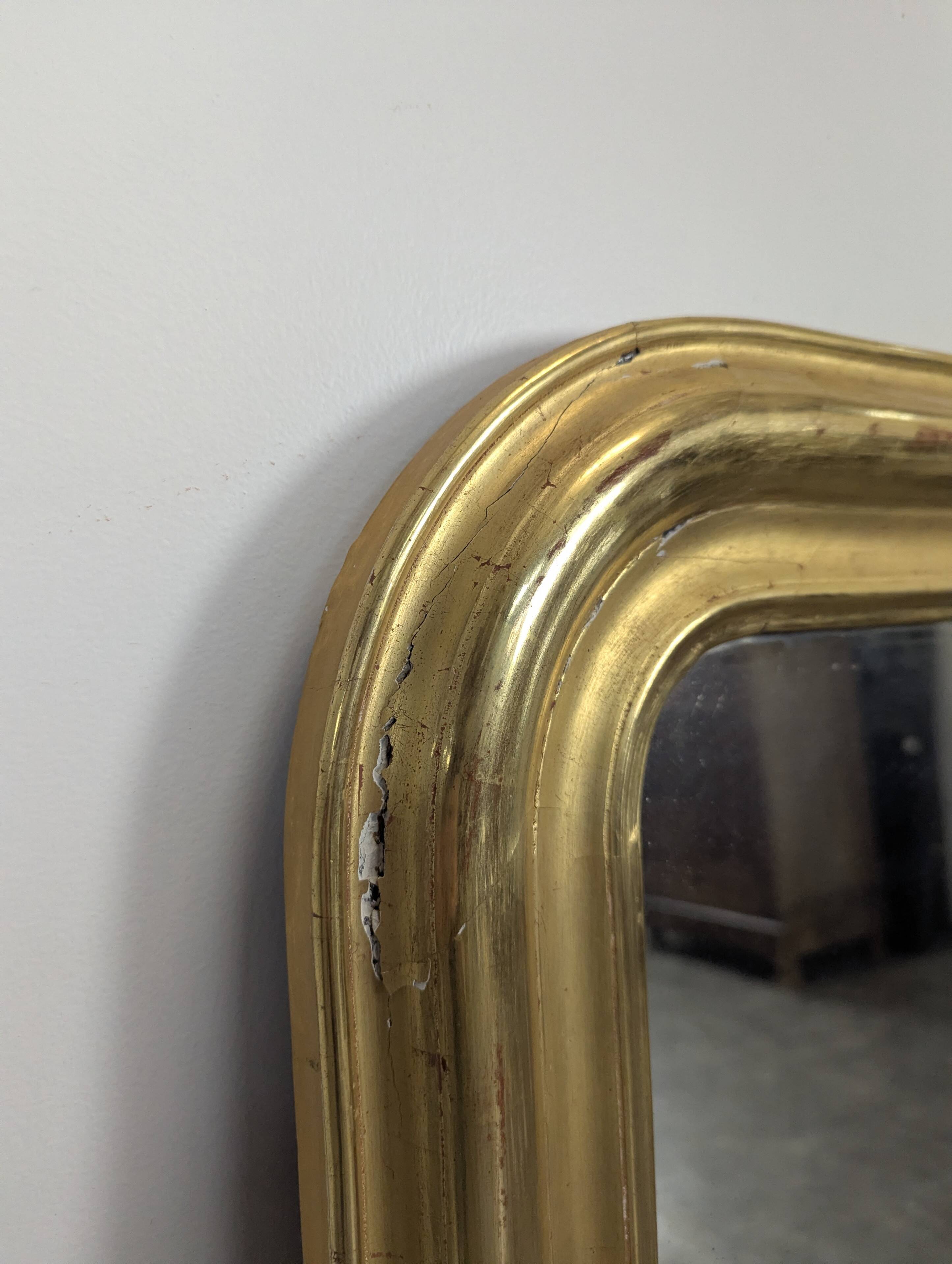 Golden mirror from the Louis Philippe period.