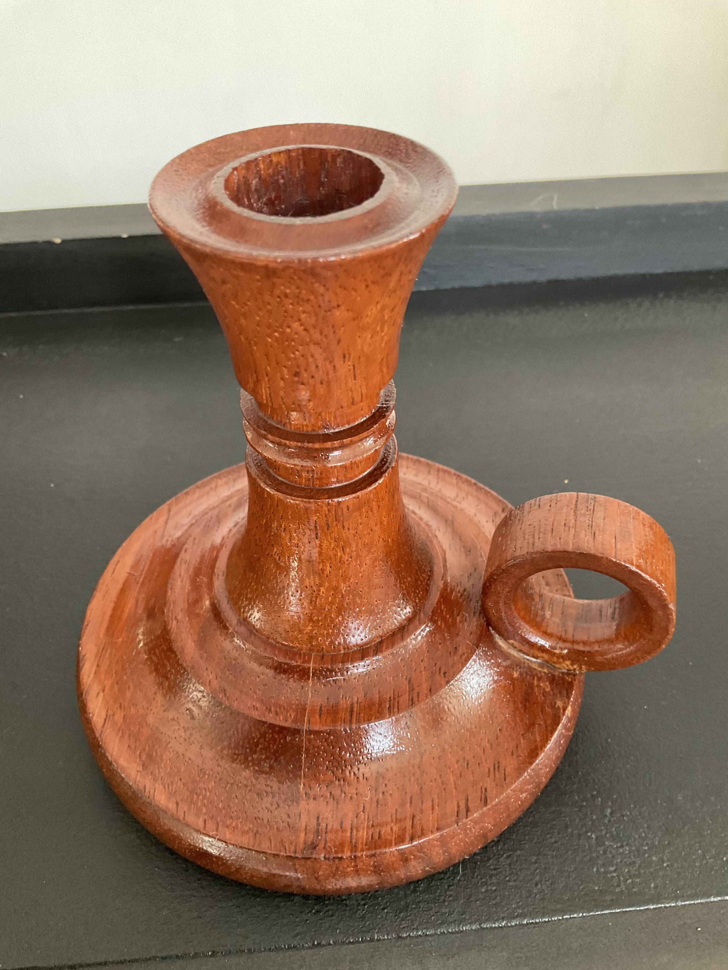 Series of 4 vintage wooden candle holders