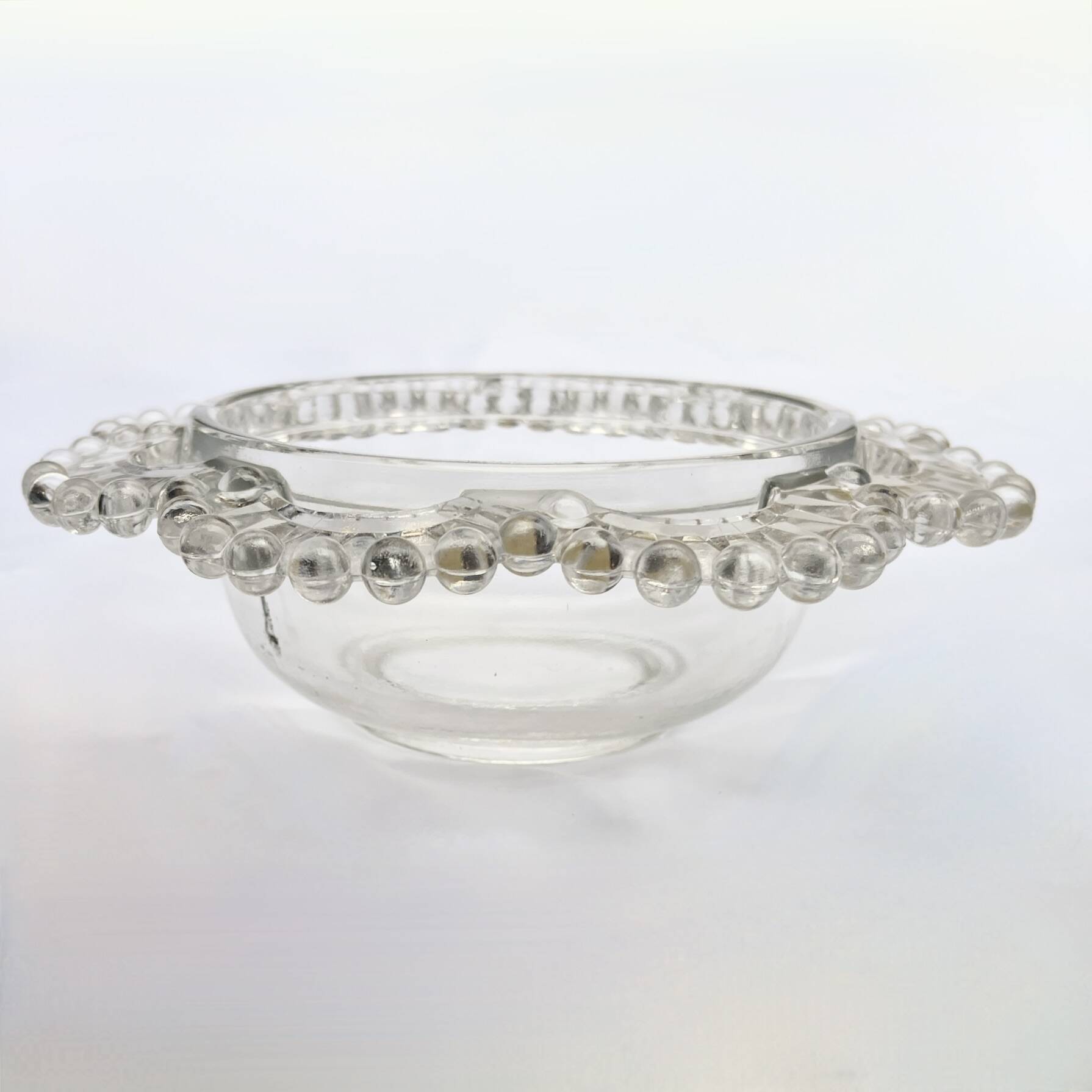 Glass salad bowl with beaded rim, 1900, Art Deco glass salad bowl in the shape of a flower