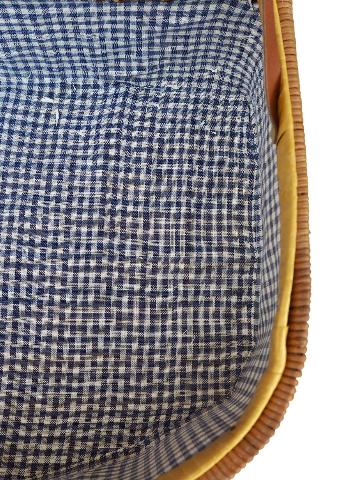 Wicker picnic basket, blue gingham interior.
