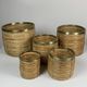 Set of 5 rattan pencil reed and brass plant holder baskets, Italy 1970s