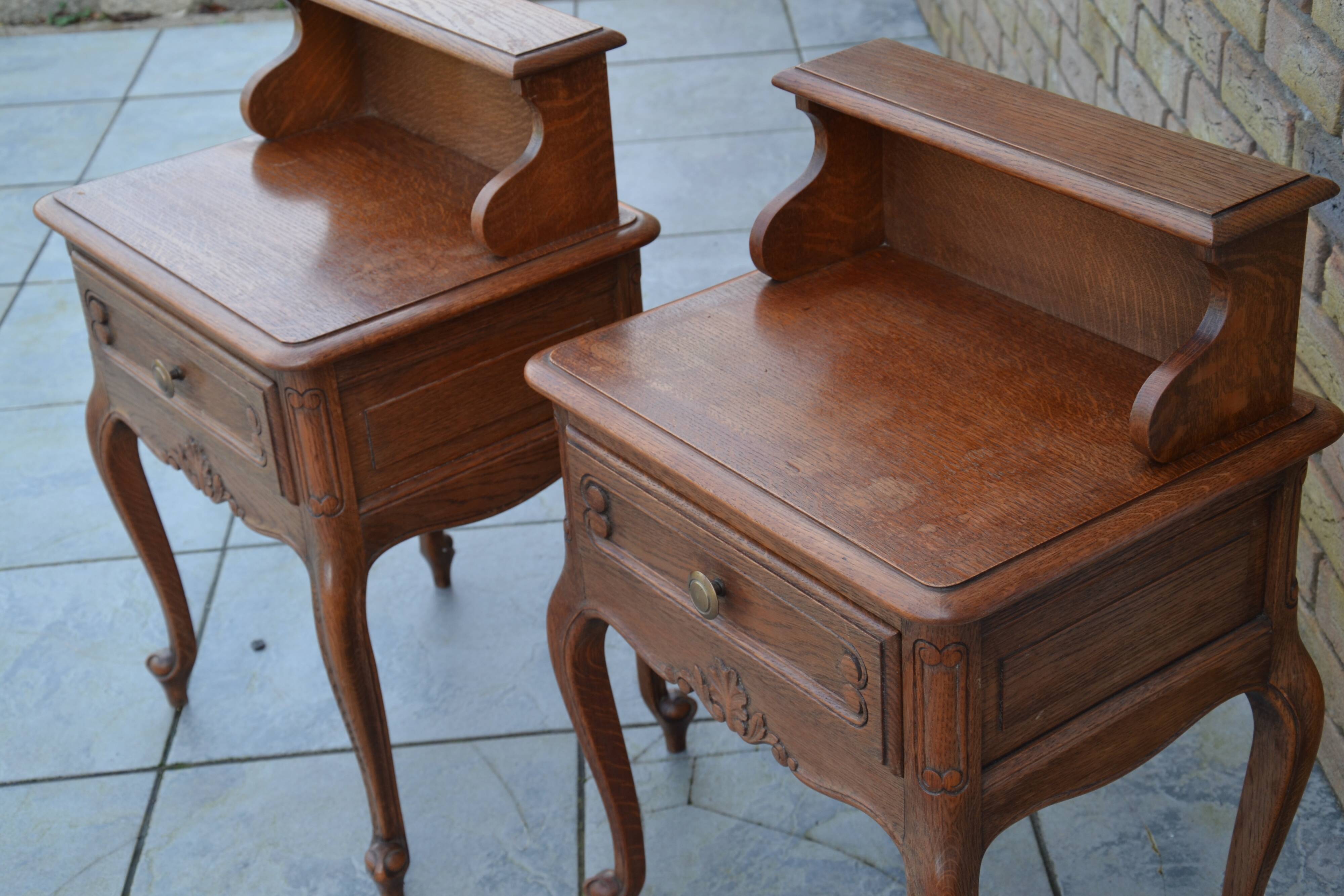 Two oak bedside tables.