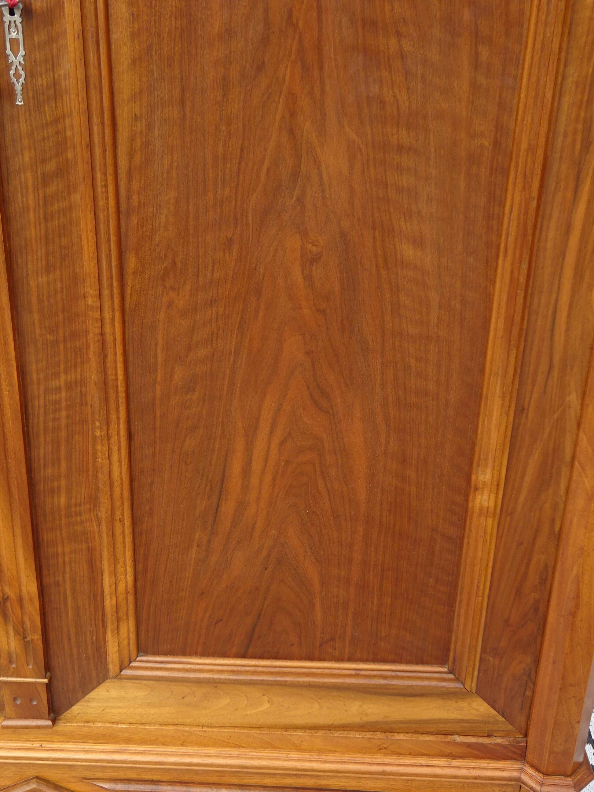 Large antique wardrobe in solid walnut