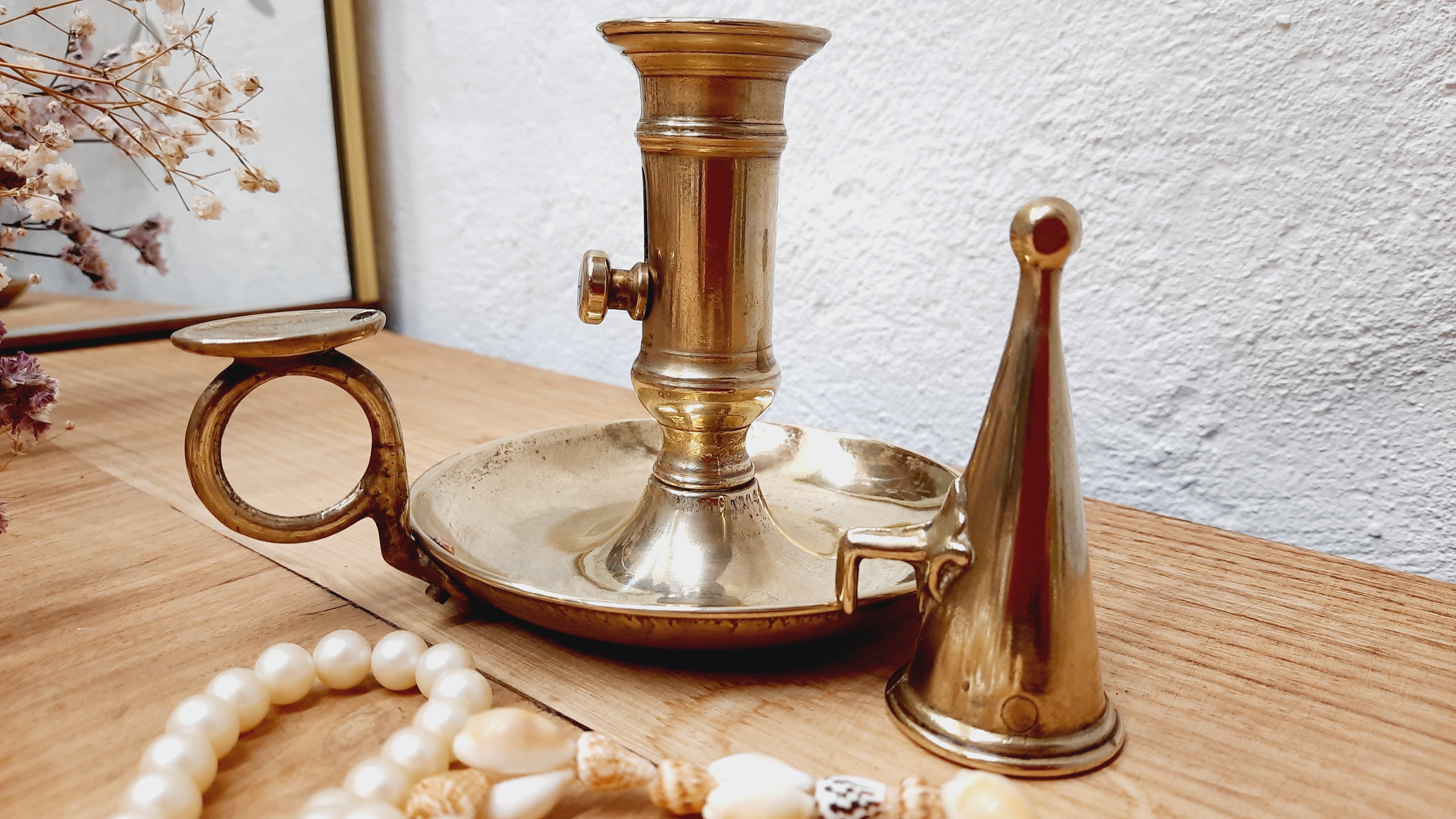 Cellar rat candle holder and brass extinguisher