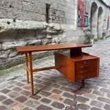 Mahogany desk with drawers by Jacques Hauville published by Bema.
