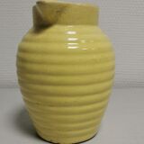 Yellow pitcher in slurry, faience onnaing frères