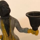 Cast iron servant monkey candle holder