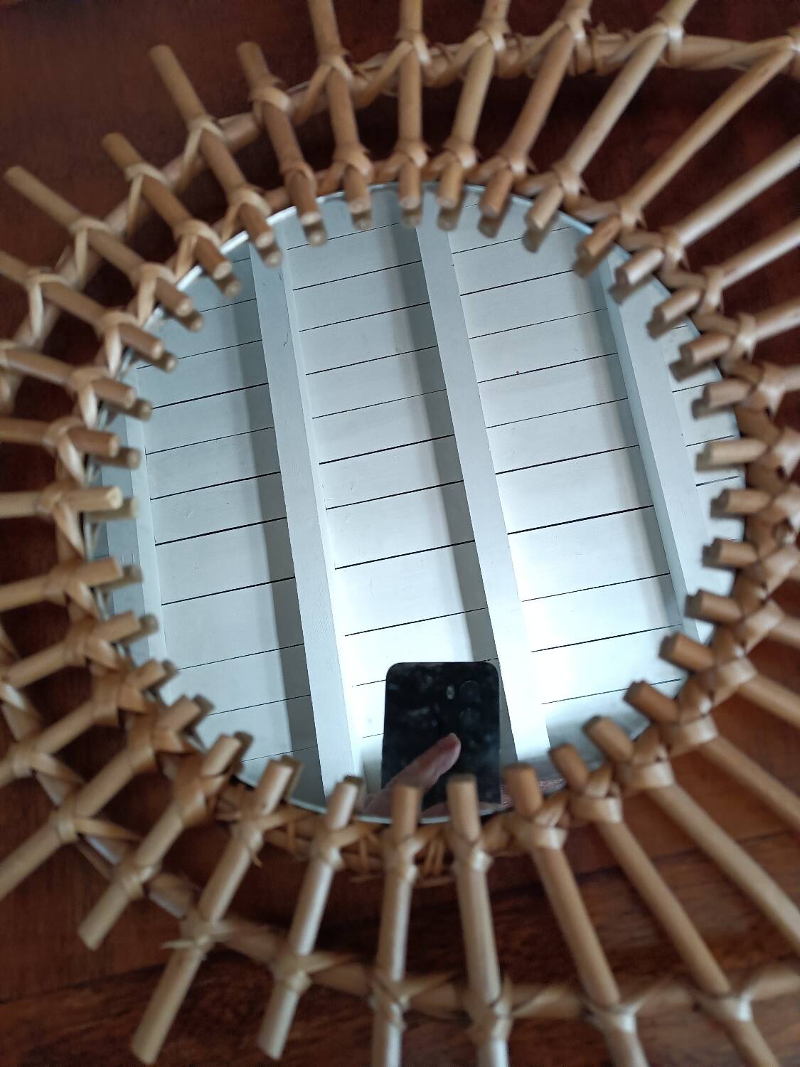 Oval rattan sun mirror