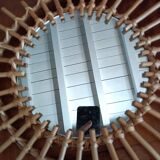 Oval rattan sun mirror