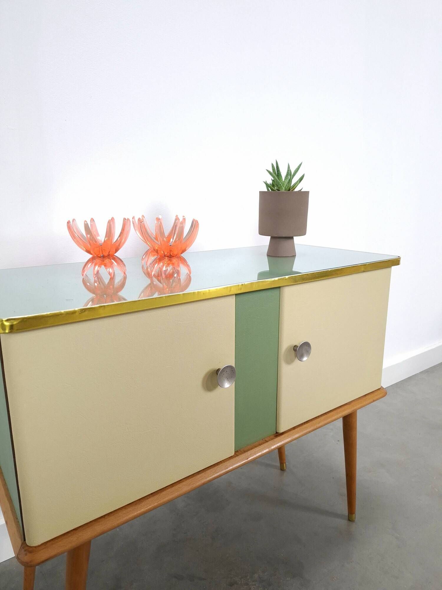 Vintage green DDR cabinet, model Libelle with glass top, slanted legs.