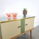 Vintage green DDR cabinet, model Libelle with glass top, slanted legs.