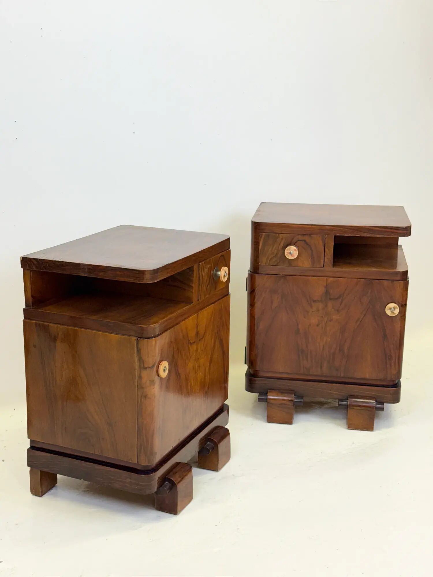 Pair of Art Deco bedside tables in walnut — Italy, 1930-1940