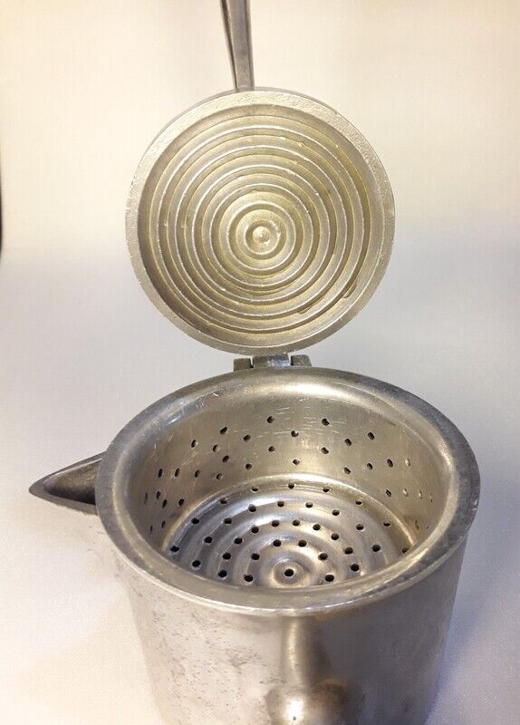 Vintage grapefruit metal citrus press