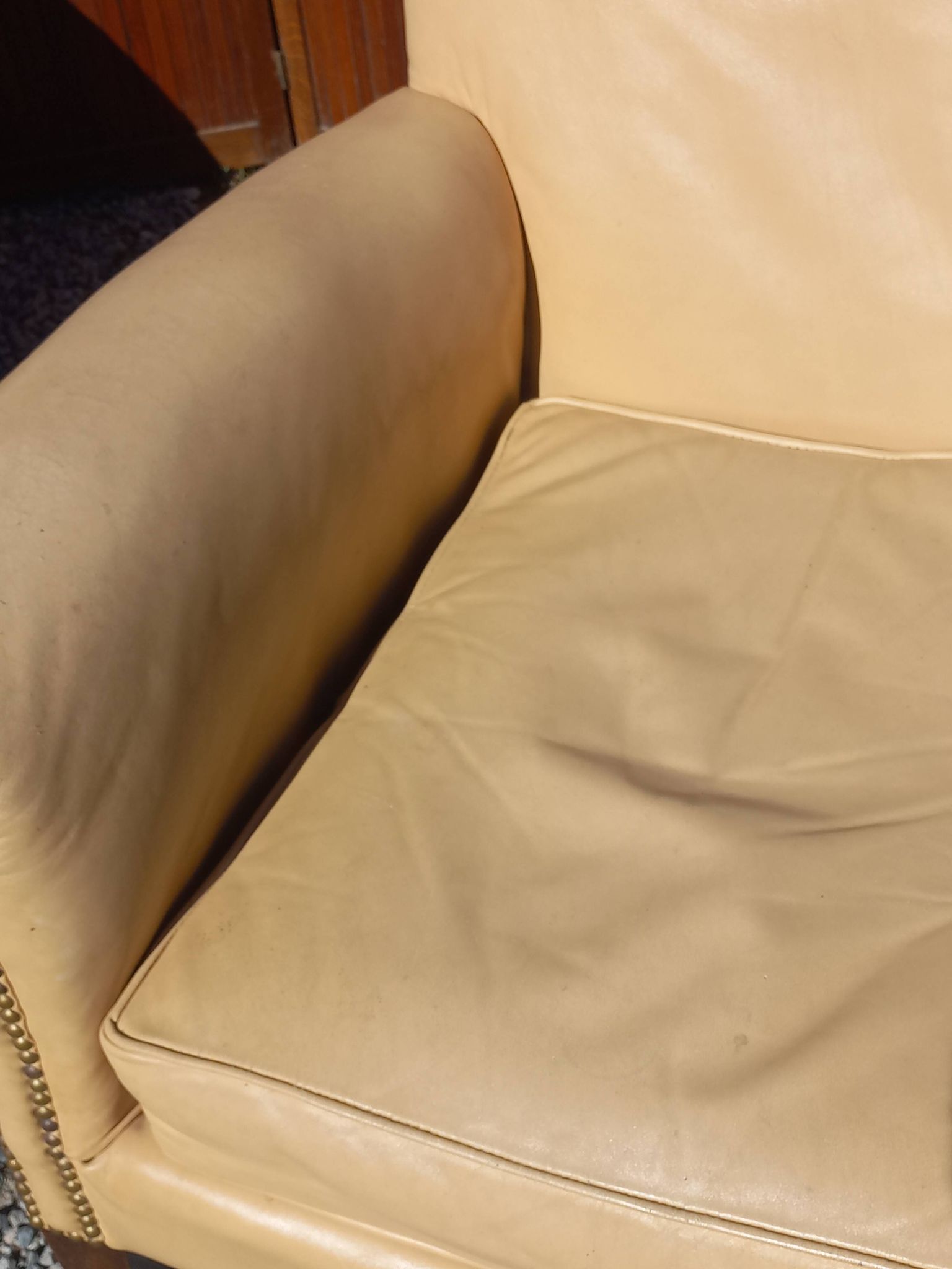 Pair of 1930s club armchairs in ivory leather.