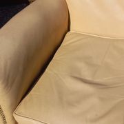 Pair of 1930s club armchairs in ivory leather.
