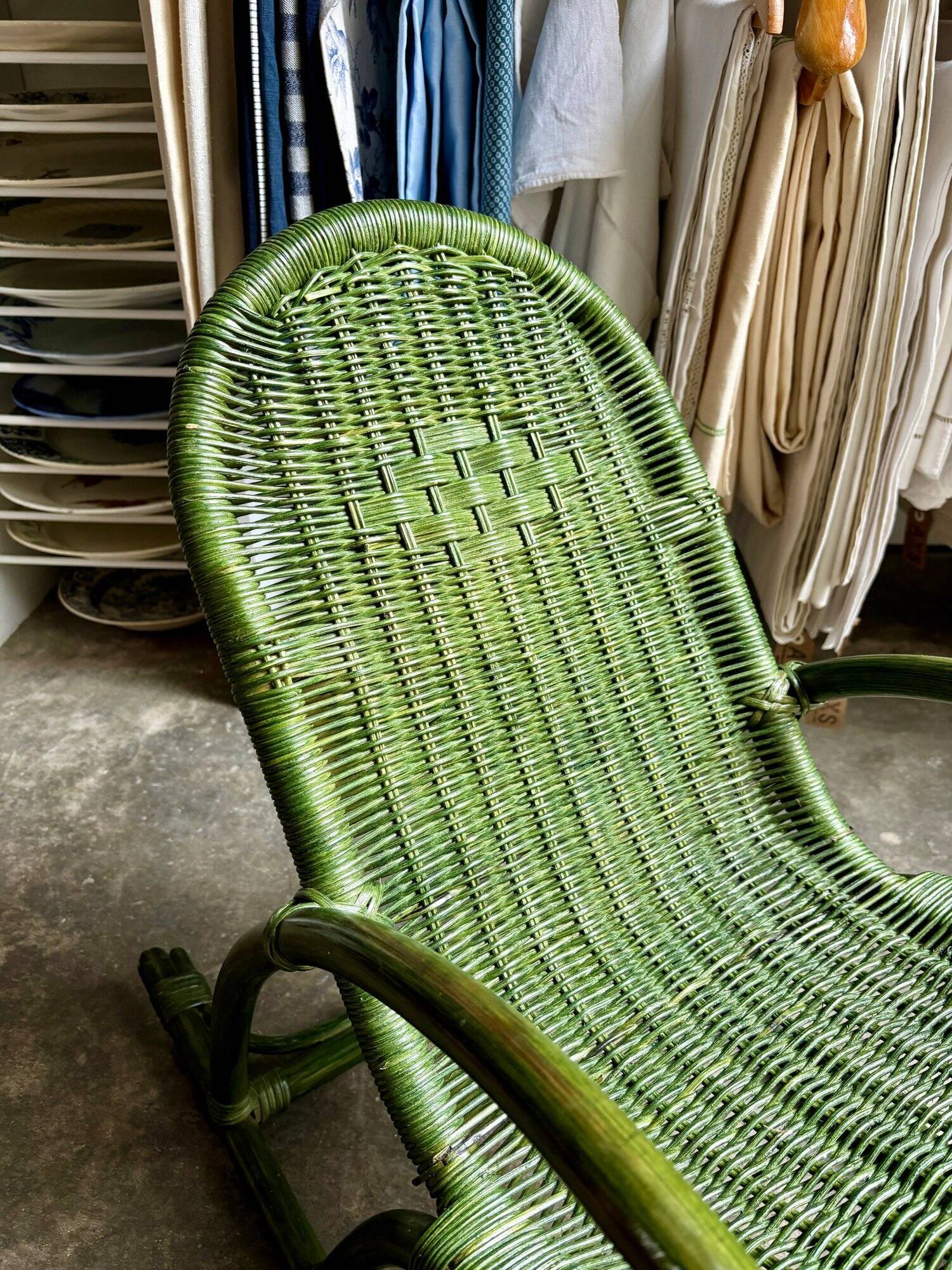 Children's rocking chair in woven wicker and green rattan