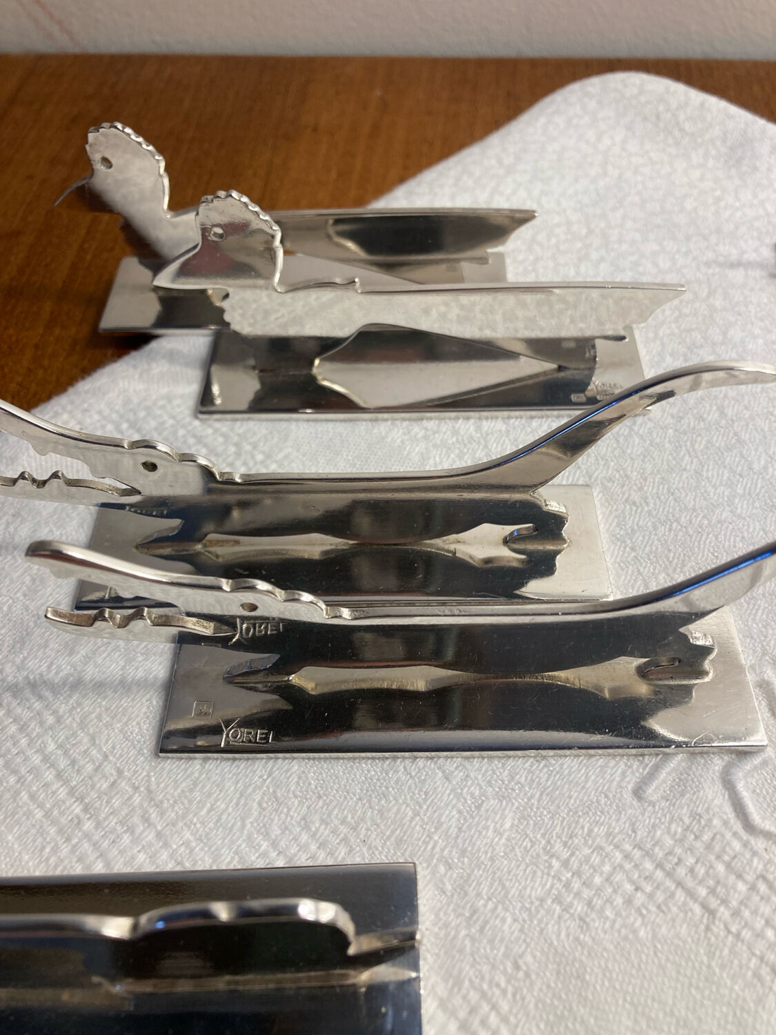 12 silver-plated metal knife rests Art Deco Yorel