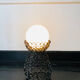 Lampe en fer forgé noir et globe en verre blanc