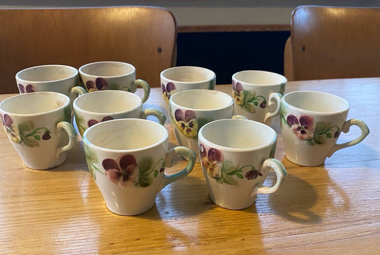 10 slipware cups, pansies