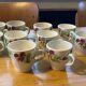 10 slipware cups, pansies
