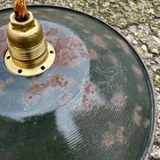 Old industrial black and white vintage enameled sheet metal pendant light