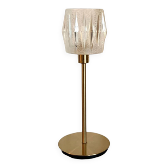Table lamp with an old art deco style globe and a golden base