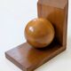 Pair of vintage bookends with polished wooden balls, Art Deco style