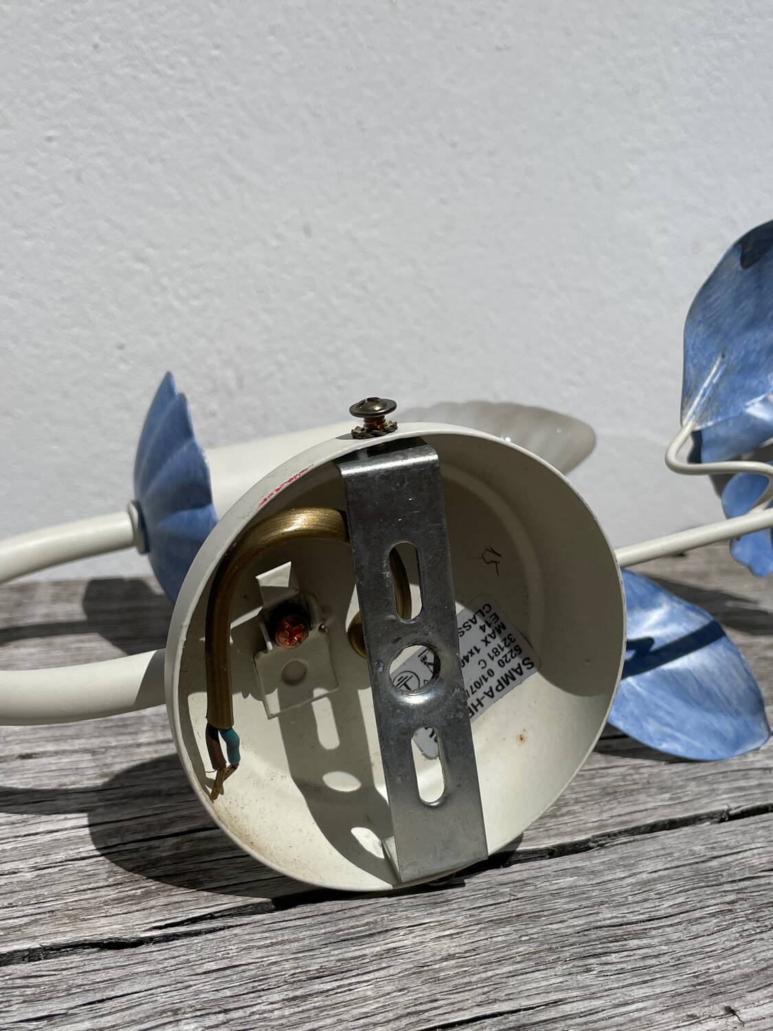 Pair of blue metal floral wall lights