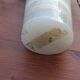 Designer lamp from the 70s in almond green onyx with original fabric shade