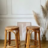 Pair of wicker bar stools and bamboo cane