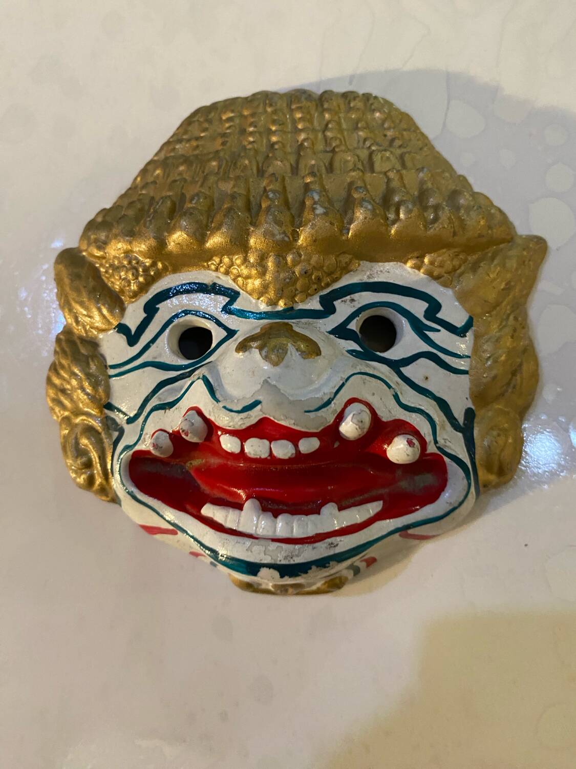 Wall mask of the Hindu monkey god.