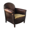 Club armchair in studded leather - early twentieth century