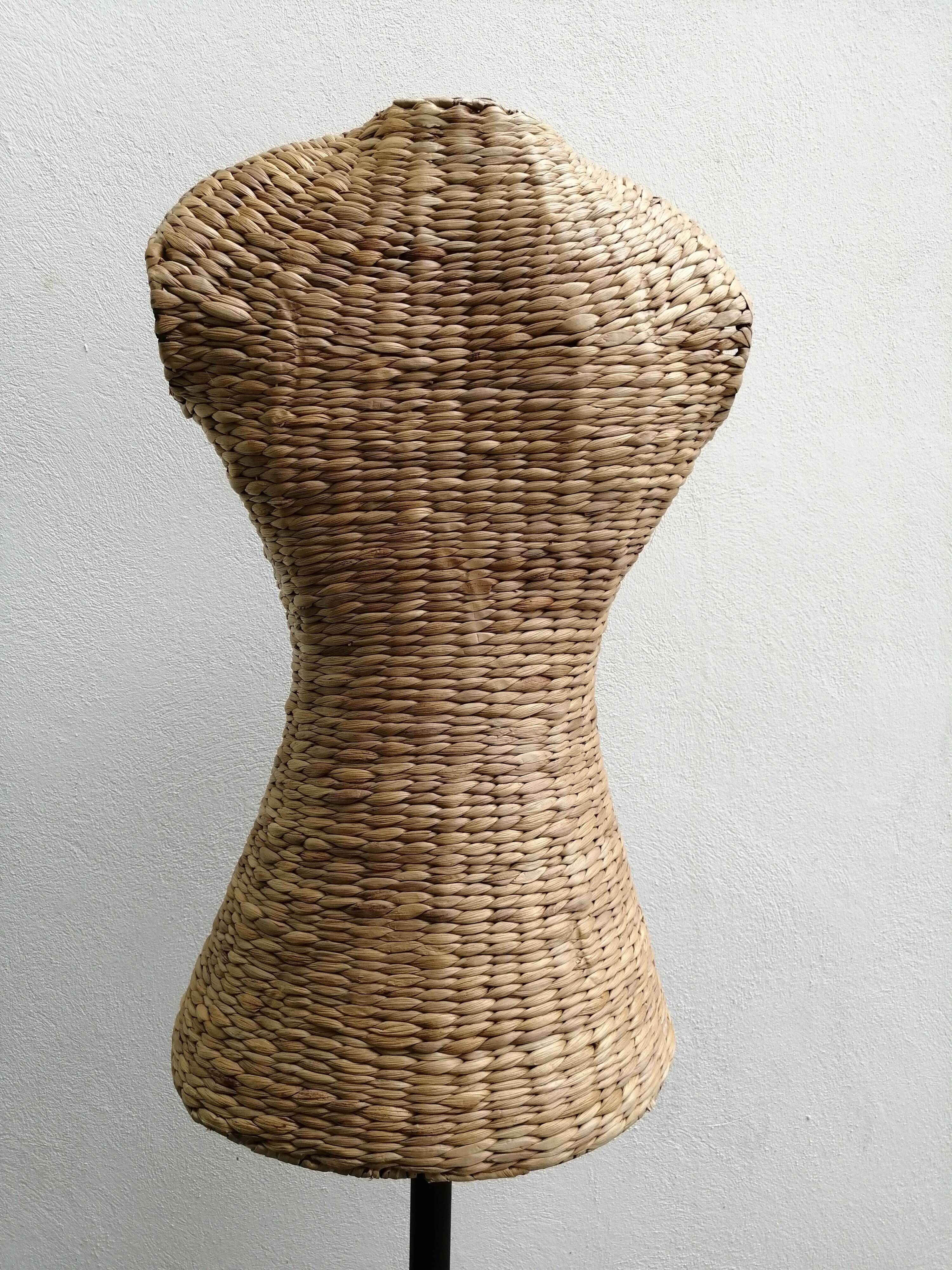 Model on a wicker stand.