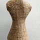Model on a wicker stand.