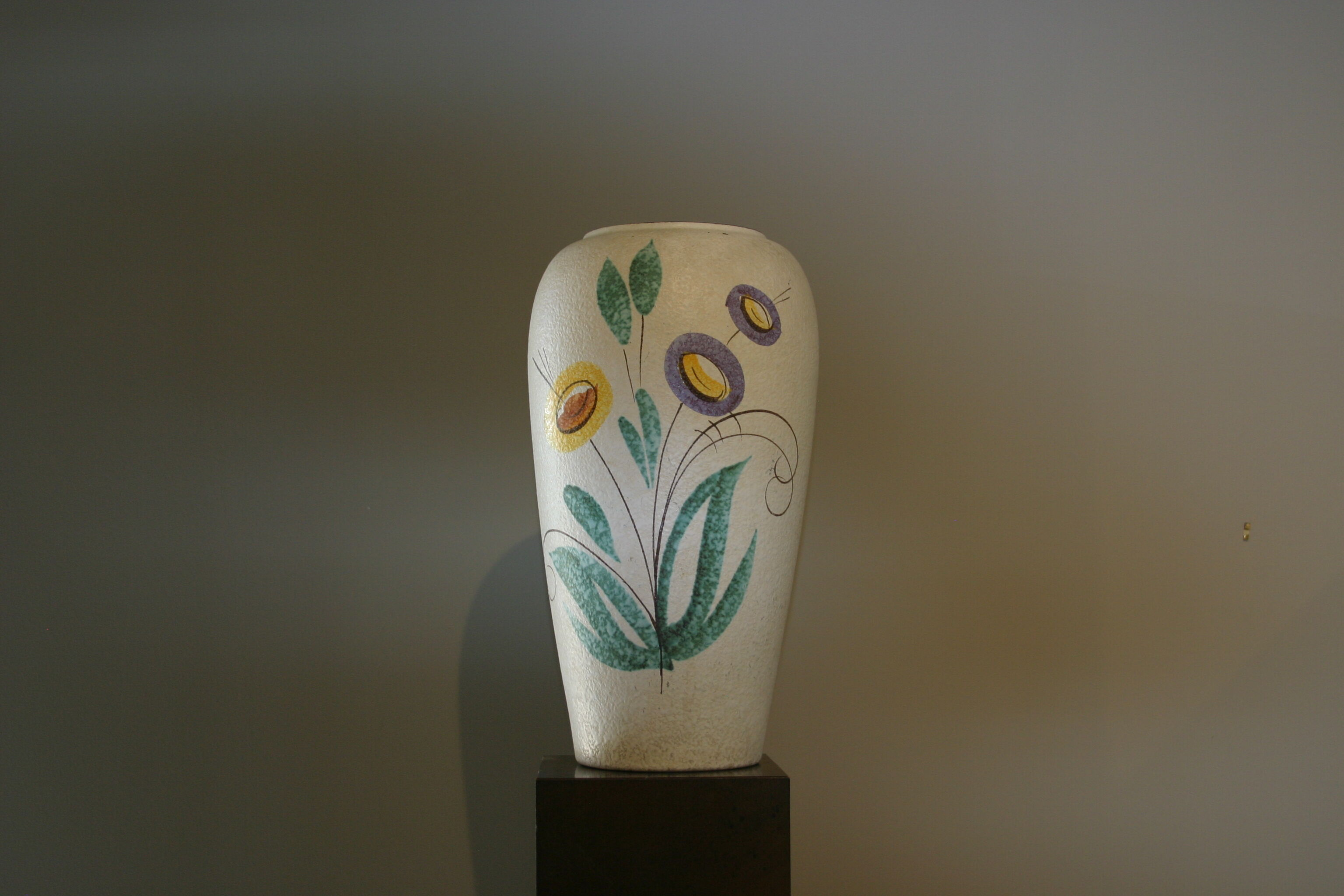 Ceramic vase with floral details