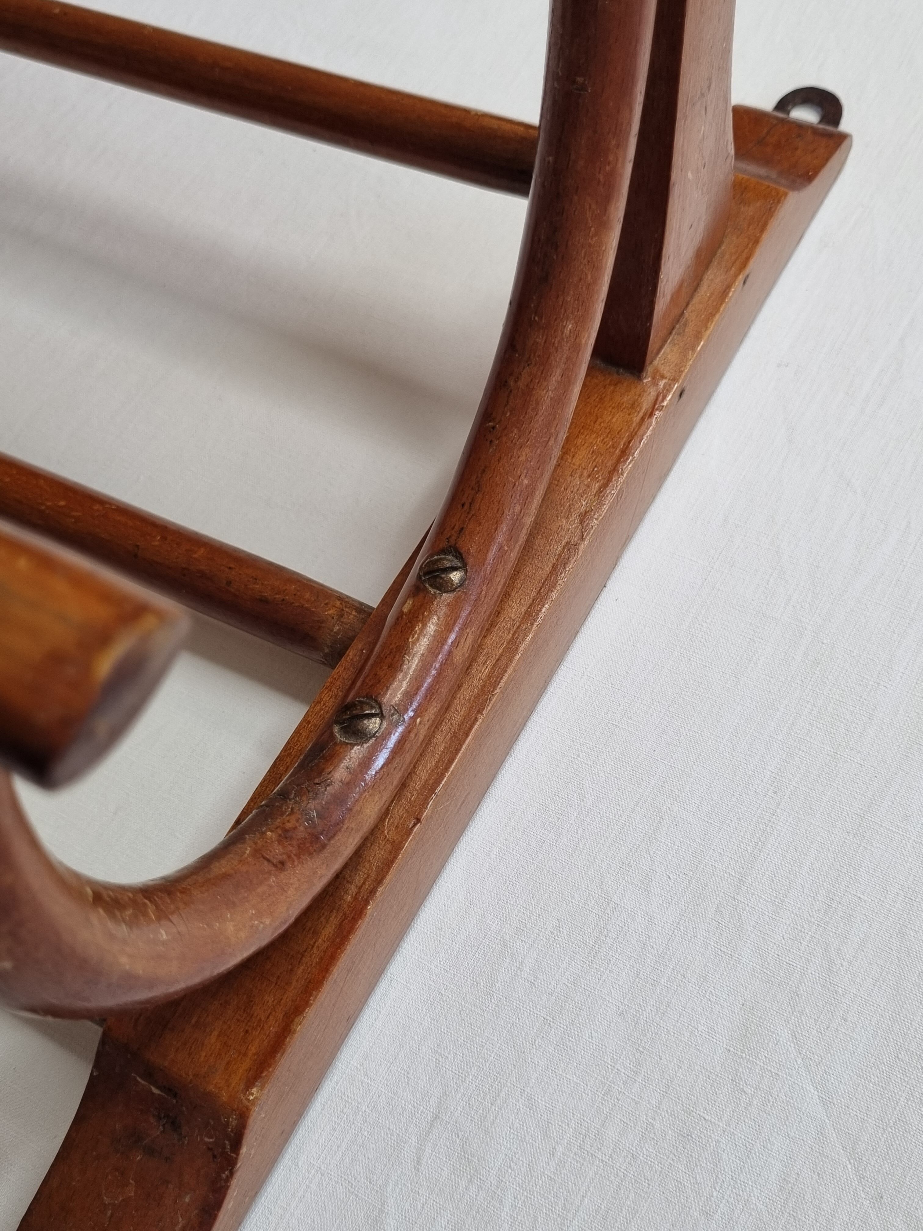 Old wall rack in curved wood, 1900s era
