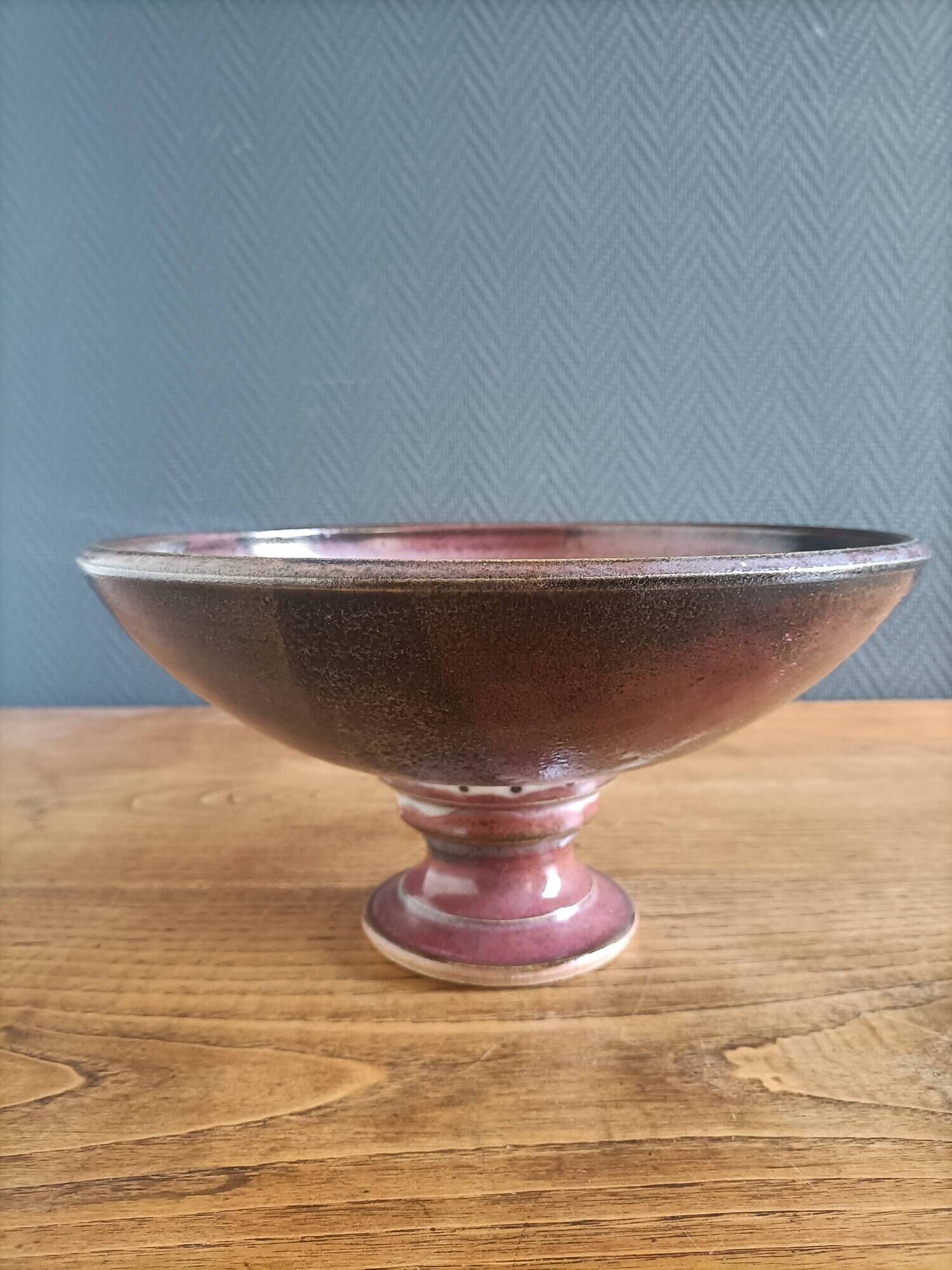 Signed ceramic fruit bowl on foot