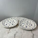 Set of 2 flat plates in English earthenware with blue floral decoration.