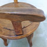 Antique oakwood barber armchair