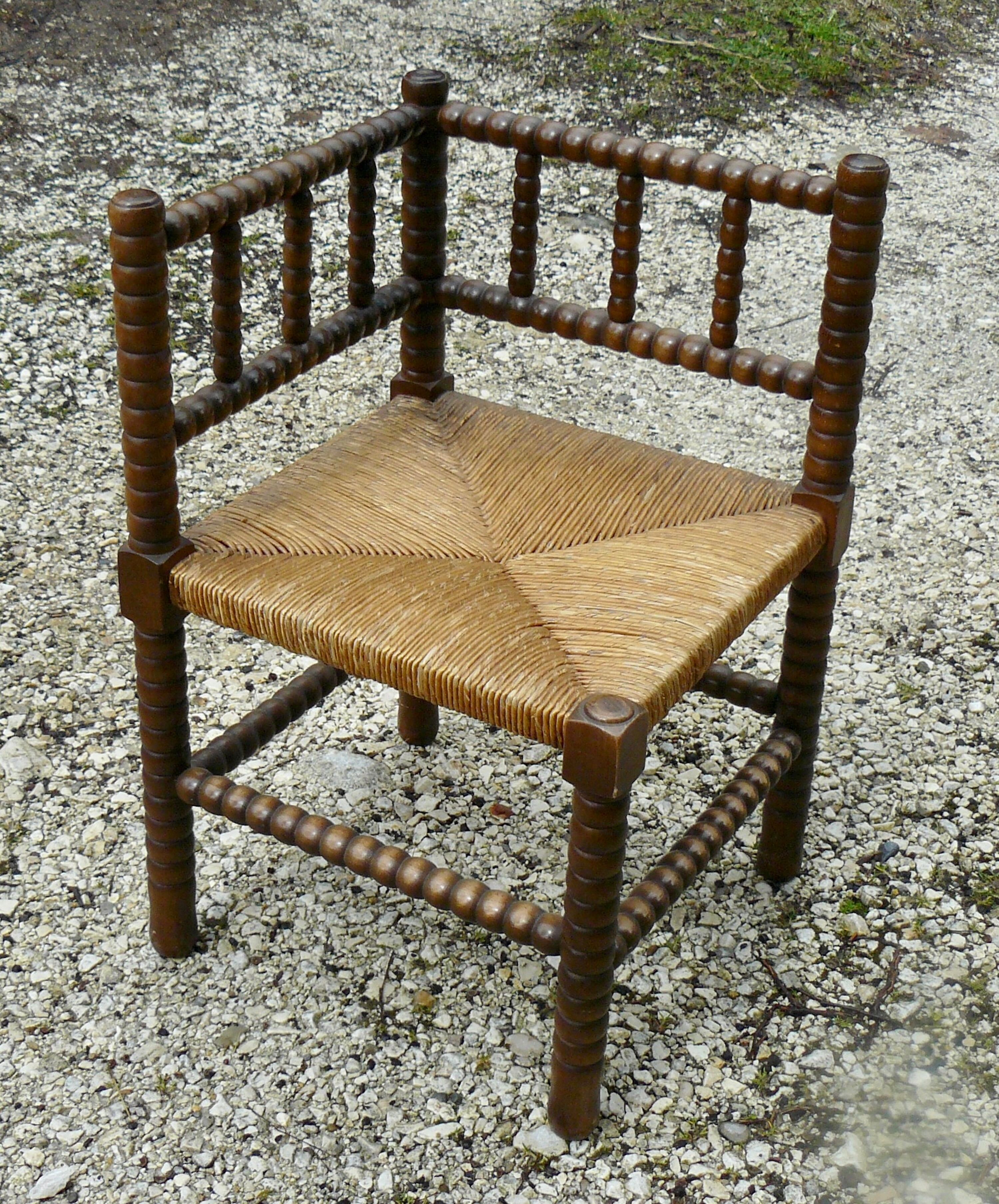 Fauteuil d'angle paillé bois tourné