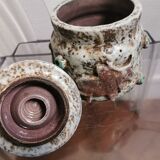Ceramic pot decorated with bulls in relief